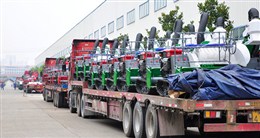 江西老機手談農友收割機